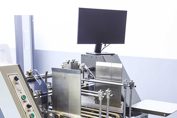 糊盒機(jī)在工作過程中出紙不順暢怎么辦？